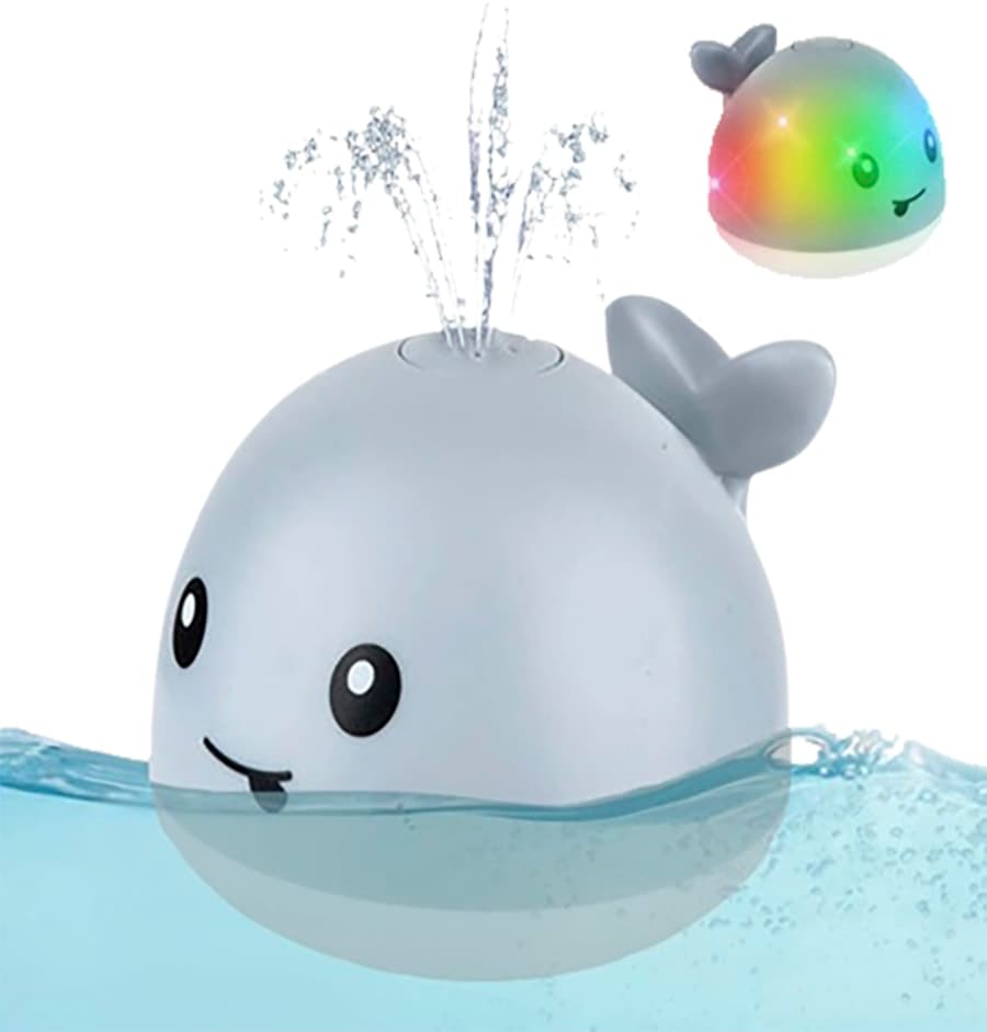 Vattensprutande Val Med Ljus