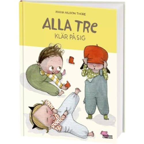Alla tre klär på sig